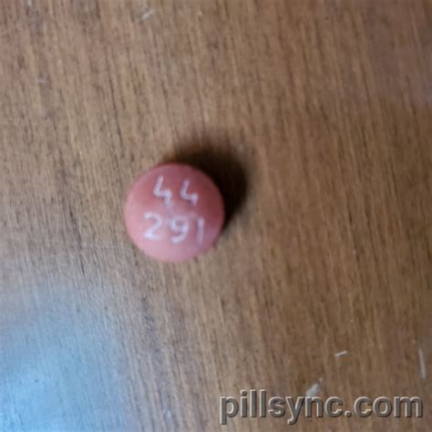 brown round Pill with imprint 44 291 tablet, film coated for treatment of Arthritis, Juvenile, Arthritis, Rheumatoid, Asthma, Bursitis, Dysmenorrhea, Fever, Gout. . 44 291 pill